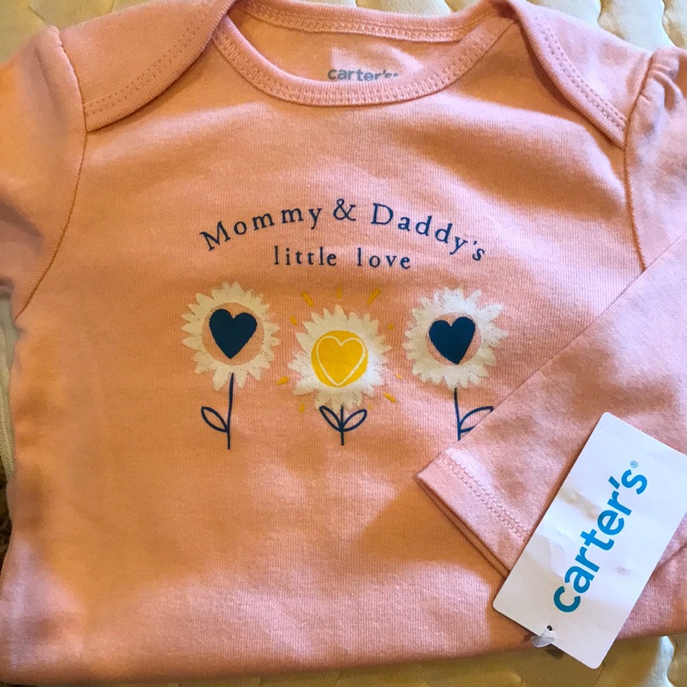 Long sleeve onesie by Carters. NWT. SIZE 12M